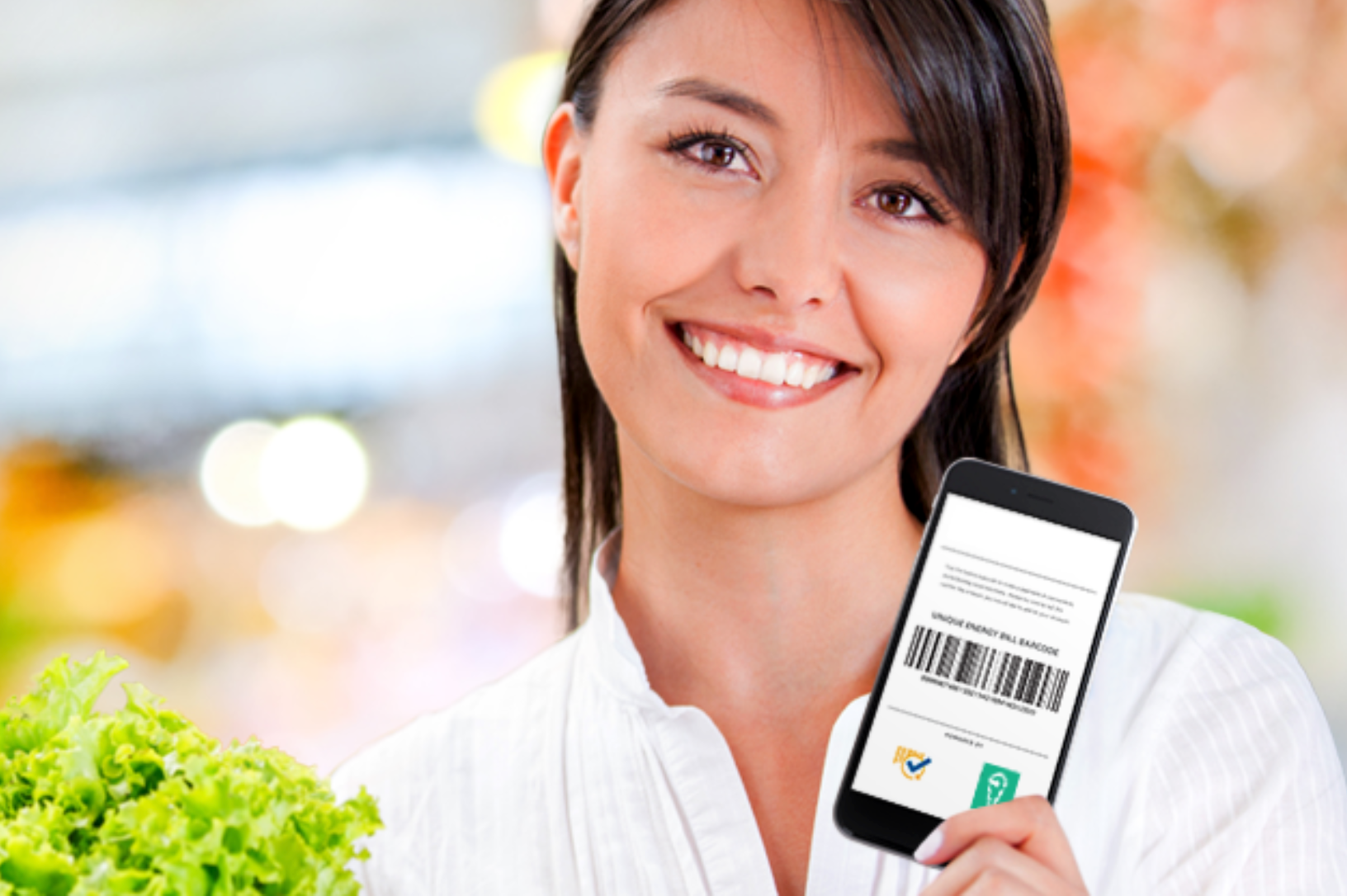 woman with checkout barcode on phone screen