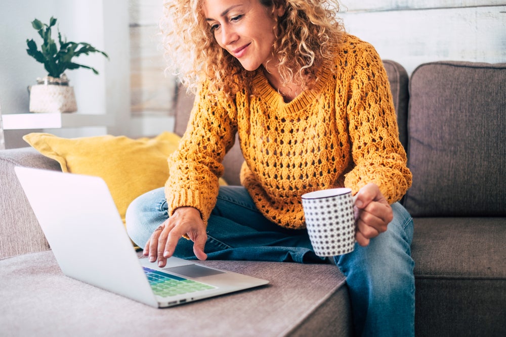 woman making payment on laptop