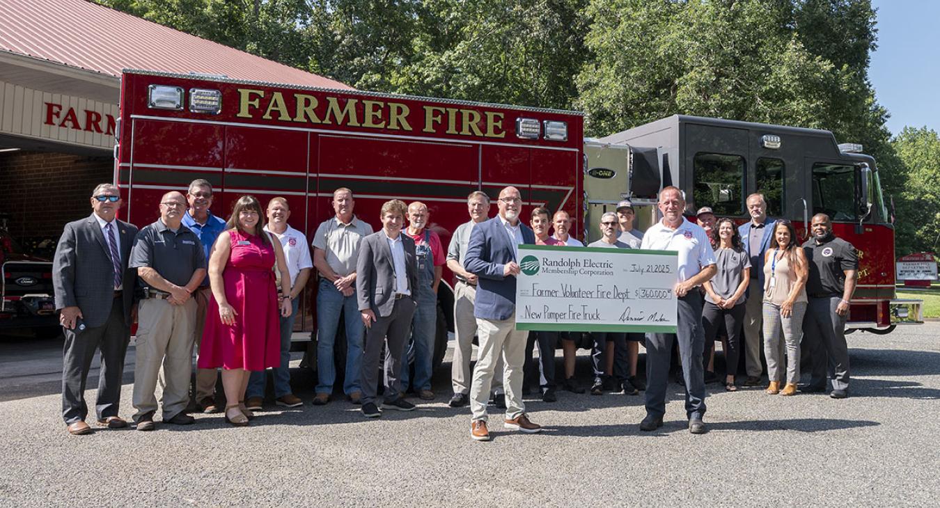 Farmer FD REDLG Check Presentation Group Photo