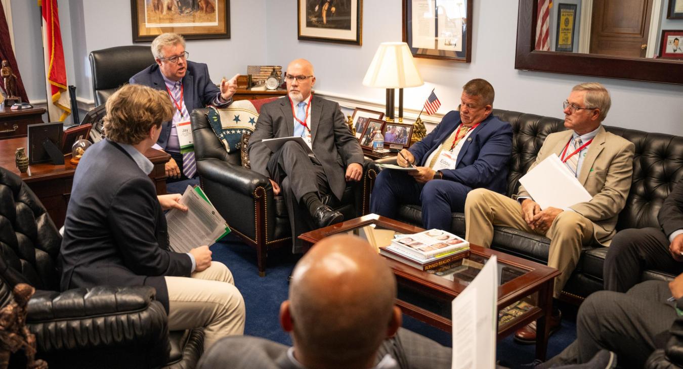REMC COO Dennis Mabe (center) attends a conference with various NC electric cooperative organizations in the office of US Congressman Richard Hudson.