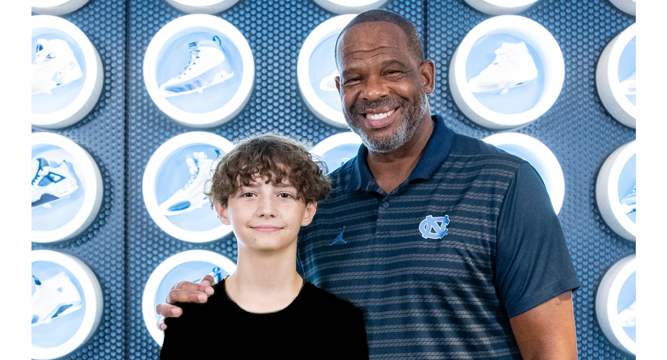 Lucas with Coach at UNC 